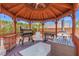 Interior view of a gazebo with a BBQ grill and cooking equipment at 6958 Lazy Sunset Ct, Las Vegas, NV 89156