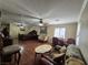 Expansive main bedroom with hardwood floors, sitting area, and elegant decor at 7104 Carrondale Way, Las Vegas, NV 89128