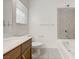 Bathroom features a tiled shower and tub combination with white fixtures at 7775 Tyrell Peaks St, Las Vegas, NV 89139
