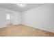 Roomy bedroom with wood-look laminate flooring and a closet at 7775 Tyrell Peaks St, Las Vegas, NV 89139