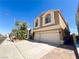Charming two-story home with a spacious two-car garage and street parking at 8125 Rio De Janeiro Dr, Las Vegas, NV 89128
