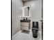 Contemporary bathroom with a floating vanity, LED mirror and modern black toilet at 825 Royal Moon Ave, Las Vegas, NV 89123