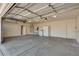 Spacious garage with washer, dryer, and plenty of room for storage and parking at 825 Royal Moon Ave, Las Vegas, NV 89123