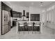 Modern kitchen featuring stainless steel appliances and marble countertops at 825 Royal Moon Ave, Las Vegas, NV 89123