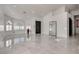 Bright living room with sleek tile flooring and modern finishes at 825 Royal Moon Ave, Las Vegas, NV 89123