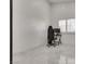 This office space includes tiled floors, plantation shutters, and modern black desk chair at 825 Royal Moon Ave, Las Vegas, NV 89123