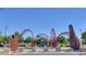 Mountain's Edge Regional Park art installation with modern sculpture and landscaped surroundings on a sunny day at 8656 Rowland Bluff Ave, Las Vegas, NV 89178