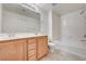 This bathroom has a double sink vanity and a shower-tub combination at 9115 Canoga Canyon Ct # 103, Las Vegas, NV 89149