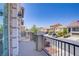Balcony view of a suburban neighborhood featuring multiple homes and a clear blue sky at 9784 Kodiak Island Ct, Las Vegas, NV 89141