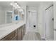 Bright bathroom with double sink vanity, and walk-in closet with lots of storage space at 9784 Kodiak Island Ct, Las Vegas, NV 89141