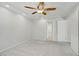 Bright bedroom with a ceiling fan, recessed lights and neutral carpet at 9784 Kodiak Island Ct, Las Vegas, NV 89141