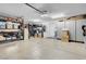Large garage offering ample space for storage and organization at 9909 Masked Duck Ave, Las Vegas, NV 89117