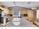 Modern kitchen featuring granite countertops, an island, and ample storage space at 9909 Masked Duck Ave, Las Vegas, NV 89117