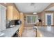 Bright eat-in kitchen features granite countertops, modern appliances, and lots of natural light at 9909 Masked Duck Ave, Las Vegas, NV 89117