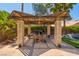 Charming covered patio perfect for outdoor dining and entertaining at 9909 Masked Duck Ave, Las Vegas, NV 89117