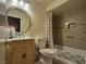 Bathroom with tub and shower, tile surround, and updated vanity at , Las Vegas, NV 89128