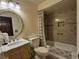 Bathroom with tub and shower, tile surround, and updated vanity at , Las Vegas, NV 89128