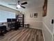 Study area with hardwood floors, a ceiling fan, and a view of the backyard at , Las Vegas, NV 89128