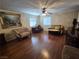 Bright living room with hardwood floors, comfortable seating, and natural light at , Las Vegas, NV 89128