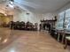 Open living room area with a fireplace and an adjacent dining area at , Las Vegas, NV 89128