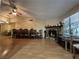 Spacious living room with a fireplace and large windows providing natural light at , Las Vegas, NV 89128