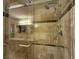 Beautifully tiled shower with glass enclosure, shower head, and accent tiles at , Las Vegas, NV 89128