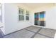 An outdoor patio featuring neutral-toned pavers and a sliding door at , Las Vegas, NV 89166