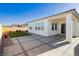 A cleanly designed outdoor patio and grassy backyard at , Las Vegas, NV 89166