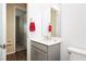 Bright bathroom featuring gray vanity with white countertop and bronze hardware at , Las Vegas, NV 89166