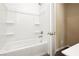 Bathroom shower and tub area is clean and features modern hardware and built-in shelving at , Las Vegas, NV 89166
