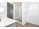 Bright bathroom featuring a glass enclosed shower and double sink vanity at , Las Vegas, NV 89166