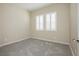 Bedroom with new carpet and two windows with shutters at , Las Vegas, NV 89166