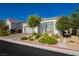Charming single story home featuring a two car garage, desert landscaping, and bright stucco at , Las Vegas, NV 89166