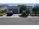 Charming single-story home features a two-car garage and a beautifully landscaped front yard at , Las Vegas, NV 89166