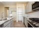 Modern kitchen features stainless steel appliances, granite countertops, and ample cabinet space at , Las Vegas, NV 89166