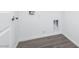 Unfinished laundry room showing the hookups and gray tile floor at , Las Vegas, NV 89166