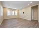 Bright room featuring wood-look floors, recessed lighting, and plantation shutters at , Las Vegas, NV 89166