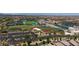An aerial view of a community school and sports complex in a luxurious neighborhood at 10349 Bressana Dr, Las Vegas, NV 89135
