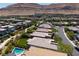 An aerial view showcases the home's neighborhood, nearby mountain range, and community landscape at 10349 Bressana Dr, Las Vegas, NV 89135