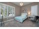 Cozy bedroom with a chandelier, shuttered windows, and modern decor at 10349 Bressana Dr, Las Vegas, NV 89135