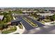 An inviting community entrance with dual gatehouses and meticulously maintained landscaping welcomes residents and visitors at 10349 Bressana Dr, Las Vegas, NV 89135