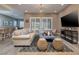Bright living area featuring stylish furniture, neutral decor, and an open layout at 10349 Bressana Dr, Las Vegas, NV 89135