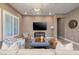 Comfortable living space featuring tile flooring, modern decor, and an open floor plan at 10349 Bressana Dr, Las Vegas, NV 89135