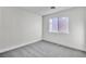 Bedroom featuring carpet and a window at 10373 Midnight Iris St, Las Vegas, NV 89183