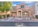 Charming two-story home with front yard, wrought iron gate and an attached garage at 10373 Midnight Iris St, Las Vegas, NV 89183