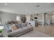 Living area adjacent to the kitchen has an open concept layout with lots of natural light at 10630 Adobe Ranch St, Las Vegas, NV 89141