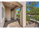 A cozy front porch area with an inviting entrance at 11219 Playa Bonita Ave, Las Vegas, NV 89138