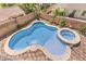 Aerial view of a private pool and spa, surrounded by brick and landscaping for a resort-like feel at 11219 Playa Bonita Ave, Las Vegas, NV 89138
