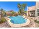 Resort-style pool and spa with an outdoor kitchen perfect for entertaining at 11219 Playa Bonita Ave, Las Vegas, NV 89138