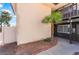 A condo entrance with a small palm tree, providing a touch of nature and a welcoming feel at 1440 Vegas Valley Dr # 13, Las Vegas, NV 89169